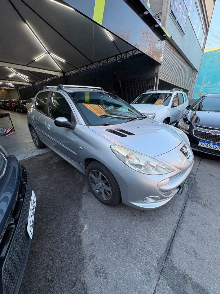 Peugeot 207 XR Sport 2013 lateral completa